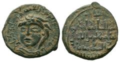 World Coins - ARTUQID of MARDIN. Nasir al-Din Artuq Arslan. 1200-1239 AD. No Mint. 611 AH. AE Dirhem