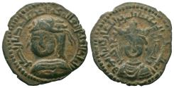 World Coins - ARTUQID of MARDIN. Najim al-Din Alpi. 1152-1176 AD. No mint. 558 AD. AE Dirhem