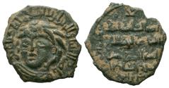 World Coins - ARTUQID of MARDIN. Nasir al-Din Artuq Arslan. 1200-1239 AD. No Mint. 611 AH. AE Dirhem
