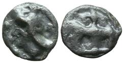 Ancient Coins - LEUCI. (Lothrigen) Northeastern Gaul. Ae, Potin. Circa 100-50 BC. Bull butting right; 'fleur de lis' above.