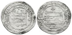 World Coins - AL-MUQTADIR, second reign. Ar, Dirham. AH 311. Madinat al-Salam mint. Citing the caliph al-Muqtadir billah and the heir Abu'l-Abbas.