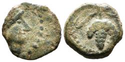 Ancient Coins - LIXUS. Mauretania. Ae. Circa 50-1 BC.  Head of Chusor-Ptah right, wearing headdress adorned with cord / Grape bunch on vine.