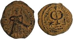 Ancient Coins - ISLAMIC. Umayyad Caliphate. Abd al-Malik (AD 685-705). AE fals (18 mm,3.0 g). Amman mint.