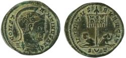 Ancient Coins - Constantine I the Great (307-337 A.D.) helmeted bronze follis (2.8 g. 19 mm.). Ticinum mint. Struck 321 A.D. VIRTVS EXERCIT. S crescent T. VOT XX. R 1