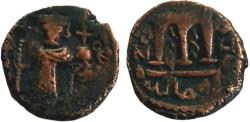 Ancient Coins - ISLAMIC. Ummayad caliphate. Arab-Byzantine series. AE fals (18 mm, 4.2 g). al-Wafa Lillah mint. Struck c. AD 650-700
