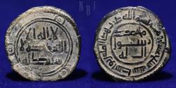 World Coins - UMAYYAD: AE fals, Mint Wasit, Date 117h, 2.82gm, RR