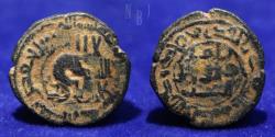 World Coins - Umayyad: AE Fals. Homs al-Mahsourah mint. Date: 137AH, 3.02gm