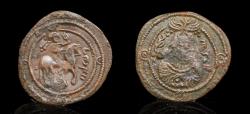 World Coins - Arab-Sasanian , Umayyad Caliphate. Anonymous. Æ Pashiz . Kāzerūn mint. No date. Crowned Sasanian-style bust right