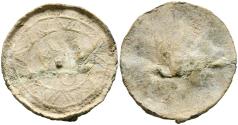 World Coins - PERIODO DE TAIFAS/ALMORÁVIDE. Amuleto monetiforme sin inscripción. (Pb. 10,37g/36mm). Posiblemente Siglo XI-XII. Anv: Recorre todo el borde una doble banda; la exterior lisa mient