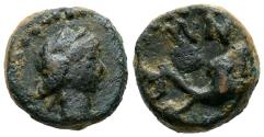 Ancient Coins - OLONT (Aznalcázar, Sevilla). Cuadrante. (Ae. 1,80g/10mm). 50-20 a.C. (FAB-1885). Anv: Cabeza masculina a derecha. Rev: Delfín a derecha, encima: NT, debajo OLO. MBC.