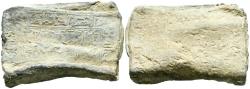World Coins - PERIODO CALIFAL O POSTERIOR. Amuleto rectangular. (Pb. 26,90g/39x28mm). Posiblemente Siglo X-XI. Placa rectangular de plomo plegada en forma de tríptico cerrado. La pieza presenta