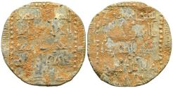 World Coins - PERIODO DE TAIFAS O POSTERIOR. Amuleto monetiforme. (Pb. 5,31g/25mm). Posiblemente S. XI-XIII. La pieza está limitada en ambas áreas por una cenefa cuadrada, de la que no es visib