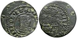 World Coins - FELIPE IV (1621-1665). 16 Maravedís. (Ae. 3,80g/25mm). Ceca no visible. 1661. Acuñación notablemente desplazada dejando un par de puntos de agarre del riel. MBC+.