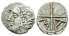 Ancient Coins - DIVISORES DE IMITACION DE MASSALIA. Trietartemorion. (Ar. 0,58g/10mm). 200-110 a.C. (FAB-1181). Anv: Cabeza masculina a izquierda. Rev: Rueda de cuatro ruedas, en el 3º y 4º cuadr