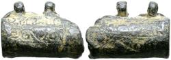 World Coins - PERIODO CALIFAL O POSTERIOR.  Amuleto-estuche. (Pb. 16,20g/30x22mm). Posiblemente Siglo X-XII. Estuche de plomo en forma cilíndrica de tapa oval y dos anillas de sujeción afrontad
