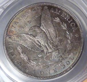 US Coins - 1886 Morgan Dollar graded MS-63 by ANACS rev color