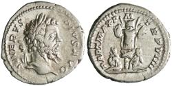 Ancient Coins - Roman: Septimius Severus (193-211), silver denarius (3.36g), Rome mint, 201 CE. Trophy between two bound captives, sitting back to back.