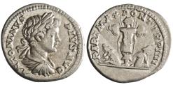 Ancient Coins - Roman: Caracalla (198-217), silver denarius (3.20g), Rome mint, 201 CE. Laureate draped bust / Trophy with two captives sitting back to back at its base.