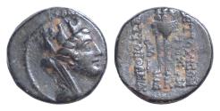 Ancient Coins - Seleukis and Pieria, Antioch Æ 17mm. 4,4g Dated Actian Era year 35 = AD 4/5. Turreted, draped, and veiled bust of Tyche to right / Tripod-lebes containing three laurel branches