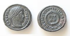 Ancient Coins - Constantine I Æ Follis. Ticinum, AD 322-325. CONSTANTINVS AVG, laureate head right / D N CONSTANTINI MAX AVG, laurel wreath enclosing VOT XX