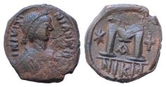 Ancient Coins - Justinian I AD 527-565. Nikomedia Follis or 40 Nummi Æ 29 mm, 18 g D N IVSTINIANVS P AVG, draped and diademed bust right / Large M, star to left, cross above, cross to right, A