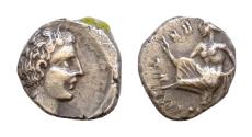 Ancient Coins - Cilicia, Tarsos. Tiribazos (Satrap of Lydia, 388-380 BC). AR Obol (8mm, 0.45g). Female kneeling l., tossing astralagoi. R/ Male head r.