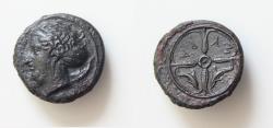 Ancient Coins - Sicily, Syracuse Æ Hemilitron. Time of the Second Democracy, circa 410-405 BC. Head of Arethusa to left / ΣY-PA, four-spoked wheel; two dolphins in lower fields