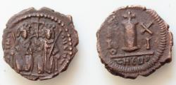 Ancient Coins - Justin II, with Sophia. 565-578. Æ Decanummium (18mm, 2,9g). Antioch mint. Dated RY 11 (575/6). Justin and Sophia enthroned facing