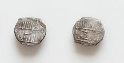 World Coins - ITALY, Sicilia (Regno). Ruggero II. 1130-1154. BI Dirham Fraction (11mm, 0.5 g). Palermo mint. Dated AH 534 (AD 1139/40). “al-mu’tazz billah/al-malik Rujjar” in Kufic in two lines