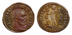 Ancient Coins - Licinius I Æ 20mm 3,7g Silvered Follis. Alexandria, AD 316-317. Laureate head right / Jupiter standing left holding Victory on a globe and sceptre; at feet to left, eagle left,