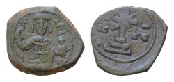 Ancient Coins - Manuel I Comnenus. 1143-1180. Æ16mm Half  Tetarteron (2.6g,). Thessalonica mint. Struck 1167-1183(?). Cross with X at center on three steps / Half-length figure of Manuel I