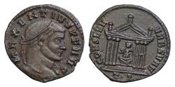 Ancient Coins - Maxentius AD 306-312. Ticinum Follis Æ 25mm., 6,16g. IMP MAXENTIVS P F AVG, laureate draped & cuirassed bust right / CONSERV VRB SVAE, Roma in hexstyle temple with orb & sceptre.