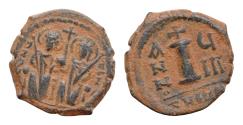 Ancient Coins - Justin II, with Sophia. 565-578. Æ decanummium. 3,7gm. 17,5mm. Theoupolis (Antioch) mint. Dated RY 4 III. Justin and Sophia seated facing on double throne,