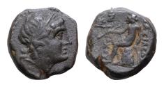 Ancient Coins - SELEUKID KINGS of SYRIA. Antiochos III 'the Great'. 223-187 BC. Æ 13mm 3,6g . Antioch mint. Laureate head of Apollo right / Apollo Delphios seated left on omphalos; monogram to out