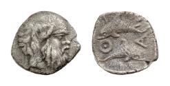 Ancient Coins - Islands off Thrace, Thasos AR 8mm 0,4g  Obol. Circa 400 BC. Head of satyr right / Dolphin swimming left above dolphin swimming right,around; all within shallow incuse square.