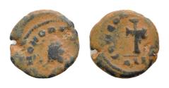 Ancient Coins - Honorius, 393-423. AE9mm 0,8g  Alexandria. D N HONORIVS P F AVG Pearl-diademed, draped, cuirassed bust right. Rev. CONCORDIA AVG Cross above groundline, ALEB