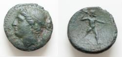 Ancient Coins - BRUTTIUM, The Brettii. Circa 214-211 BC. Æ 20mm 4,7g. Head of Nike left, wearing stephanos; grain ear behind neck / Zeus standing right, holding thunderbolt and scepter
