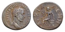 Ancient Coins - Thrace, Anchialus. Maximinus, AD 235-238. AE. 8.8g. 23 mm.  Hermes seated on rock, left, wearing petasus and holding caduceus.