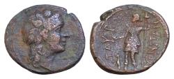 Ancient Coins - Sicily, Tauromenion, c. 200-186 BC. Æ (22-24mm, 8.8g, ). Head of Dionysos r., wearing ivy wreath. R/ Artemis standing l., holding patera and torch.