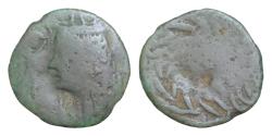 Ancient Coins - Islands off Sicily, Kossura Æ 19mm. 3g c. 3rd-2nd century BC. Bust of Isis to left, crowned by Nike, advancing to right and holding wreath; star(?) below / Laurel wreath