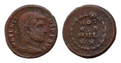 Ancient Coins - Maxentius, 306-312. 1/3 Follis  16 mm, 1.9g Ostia, 310-312. MAXENTI VS P F AVG Laureate head of Maxentius right.  VOT Q. Q MVL XX in four lines within wreath tied with medallion