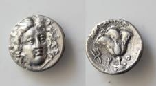 Ancient Coins - CARIA. Rhodes. Drachm (229-205 BC). Ameinias, magistrate. Obv: Head of Helios facing slightly right. Rev: P - O / AMEINIAΣ. Rose with bud to right. Control: trident in left field.