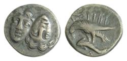 Ancient Coins - MOESIA, Istros. Circa 4th Century BC. AR 18mm Drachm (6,83gm). Facing male heads, the right inverted / Sea-eagle left, grasping dolphin with talons Toned Good Very Fine