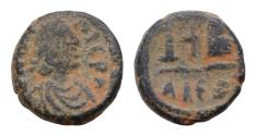 Ancient Coins - Justin I. 518-527. Æ 12 Nummi 14,5mm, 4.4g. Alexandria mint. Diademed, draped, and cuirassed bust right / Cross between large IB; AΛEΞ.