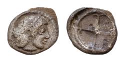 Ancient Coins - Sicily, Syracuse. Time of Hieron I, c. 480-470 BC. AR Litra (8,5mm, 0.54g). Head of Arethusa right.  Wheel with four spokes.