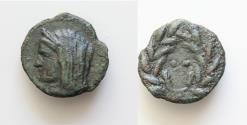 Ancient Coins - Sicily, Uncertain Roman mint, late 2nd century BC. Æ (16.5mm, 2.54g). Veiled head of Demeter l. R/ Two pellets within wreath. CNS I, 107 (Panormus) var. (one pellet); HGC 2, 1702 v