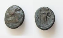 Ancient Coins - SICILY, Messana. The Mamertinoi. 215-202 BC. Æ Onkia (12mm, 2.03 g, 6h). Head of Aphrodite right; dove to left / Warrior standing left, holding sheathed sword and spear; trophy