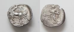 Ancient Coins - Sicily, Entella AR Litra. Circa 430-420 BC. Female figure standing to left, holding phiale over altar and with filleted temple key in arm / Man-headed bull standing to right;