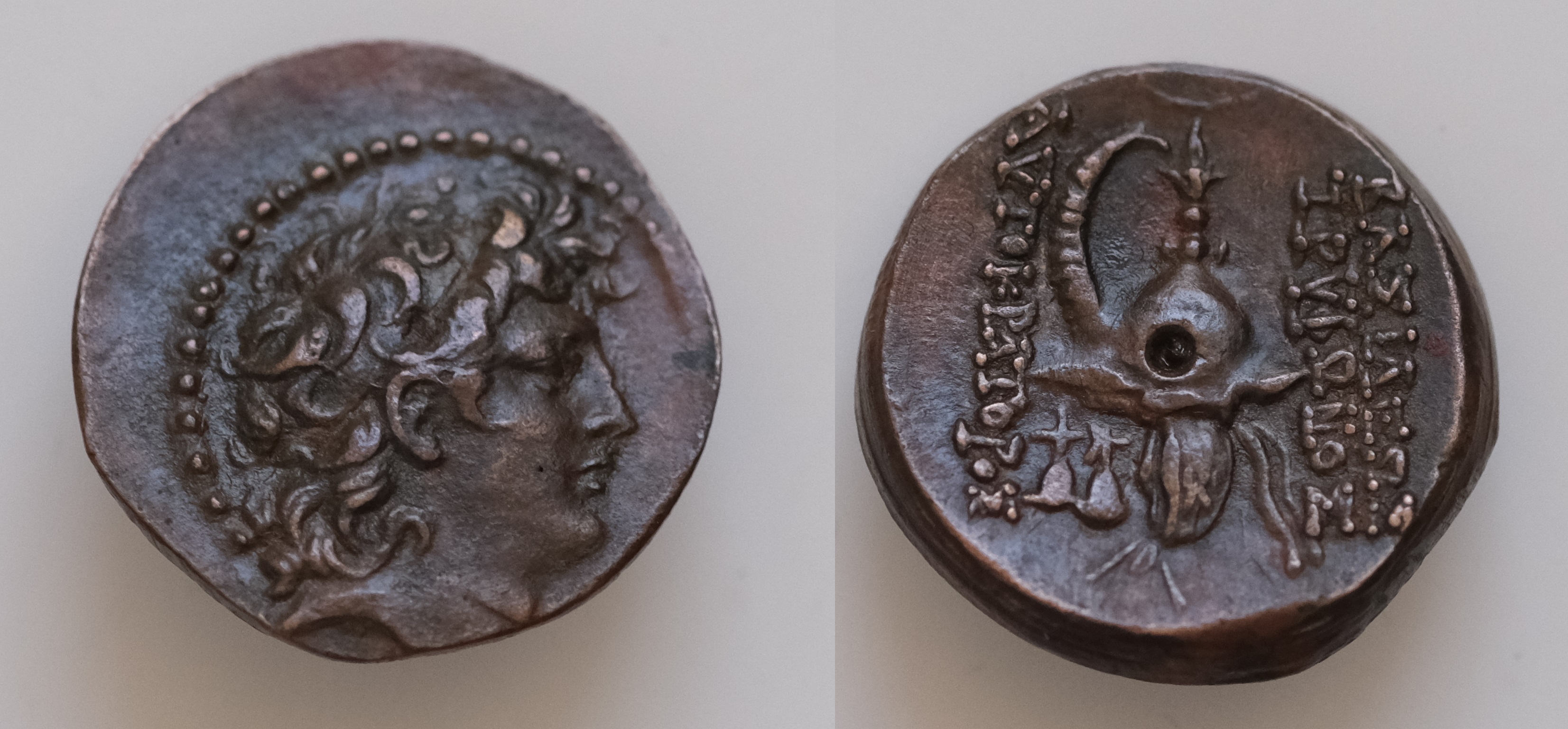 SELEUKID KINGS of SYRIA. Tryphon. Circa 142-138 BC. Æ 18mm, 4,4g, Antioch  mint. Diademed head right / Spiked Macedonian helmet adorned with wild goat  horns