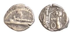 Ancient Coins - Samaria, uncertain mint AR Obol. Circa 375-333 BC. 0,6g.9mm. Sidonian galley to left over waves. Rev: Persian king battling lion, O between; all within incuse square.